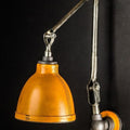 Foundry Nine Netherby Cast Bronze Bronze Arm with a Stitched Leather Shade Wall Light